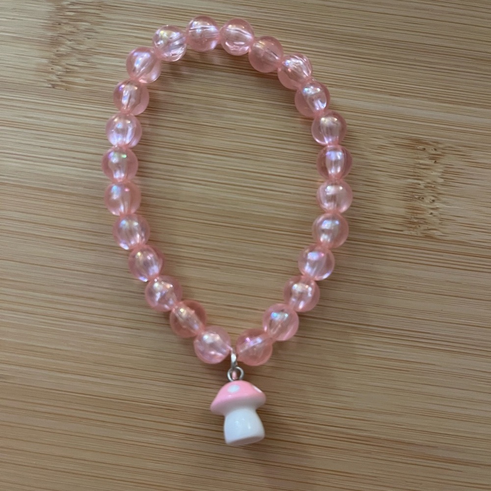 Pink Beaded Bracelet with Mushroom Charm